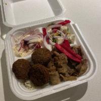 Falafel Plate · 6 pieces falafel served on bed of lettuce with hummus, house salad, pita bread, tahini sauce...