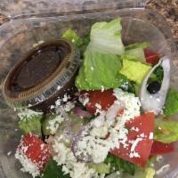 Greek Salad · Romaine, cucumbers, tomatoes, mixed peppers, sweet red onions, black olives, feta cheese, an...