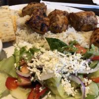 Chicken Shish Kebab · Cubed marinated chicken meat. Served with rice, Greek salad, and the Host's fresh-baked bread.
