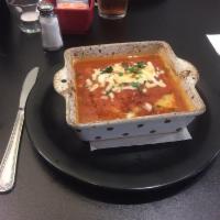 Meat Lasagna · A generous portion of our family recipe lasagna layered with ground beef and ricotta cheese,...