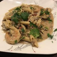 Sinatra Pasta · Penne pasta with shrimp, porcine mushrooms, roasted peppers in light cream sauce.