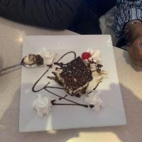 Tiramisu · Espresso soaked cake topped with Italian custard, and chocolate.