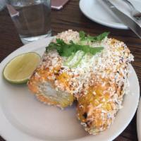 Elote · grilled corn on the cob, chipotle mayo, cotija cheese