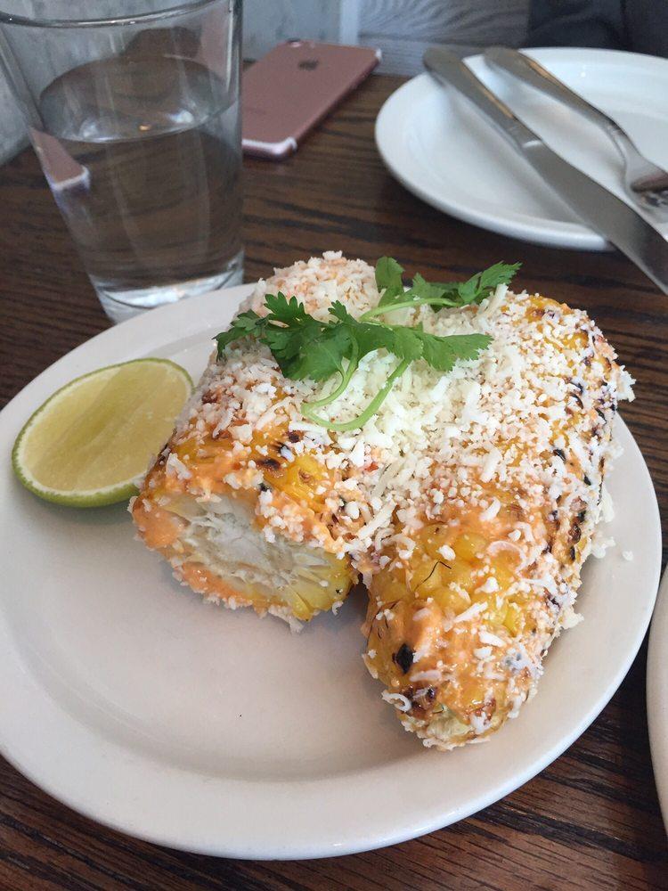 Elote · grilled corn on the cob, chipotle mayo, cotija cheese