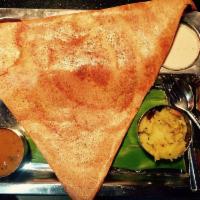 Masala Dosa · Mashed potato stuffed crepe. South Indian rice crepe made from fermented rice and black gram...