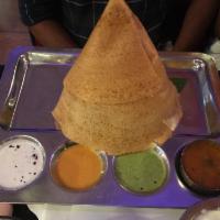 Ghee Roast Dosa · Buttered rice crepe. South Indian rice crepe made from fermented rice and black gram batter ...