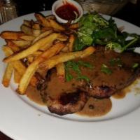Steak Frites · 10 oz. grilled shell steak, served with french fries and mixed greens.
