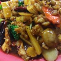 Hunan Chicken · Hot and spicy. Sliced chicken breast, cooked in a spicy brown sauce with Chinese vegetables.