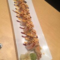 Shaggy Dog Roll · Shrimp tempura and avocado topped with crabmeat, spicy mayo and eel sauce.8 Piece 