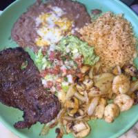 Carne Asada · Tender skirt steak seasoned with Mexican spices, served with grilled onions, mushrooms, pico...
