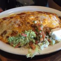 Carne Asada Burrito · This delicious burrito made with our seasoned to perfection carne asada skirt steak, rice, b...