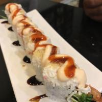 King Kong Roll · Fresh shrimp tempura topped with crab meat, tempura flakes sweet chilli, and house spicy sau...