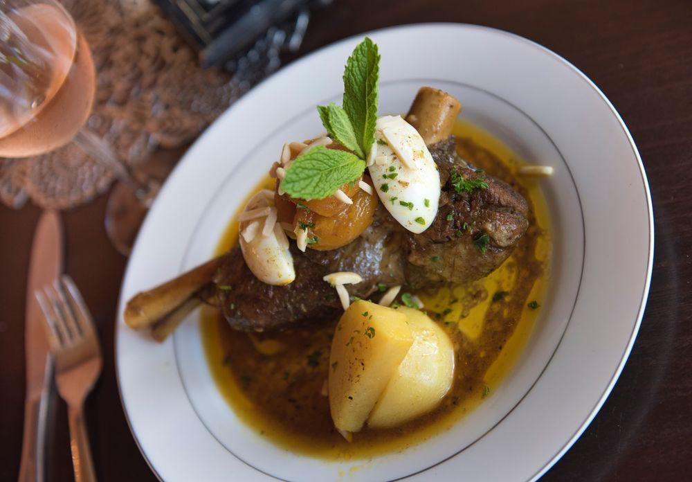 Lamb Shank · Braised lamb shank in chef’s Moroccan spices and herbs, with apricots and raisins. Served with marokko’s roasted potatoes. Dairy free.