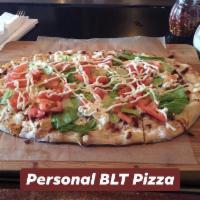 BLT Pizza · Mozzarella, bacon, lettuce, tomato and mayonnaise.