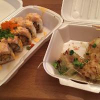 Kevin's Roll · Deep-fried panko shrimp and cucumber, topped with snow crab, unagi sauce and spicy mayo, gre...