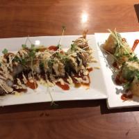 Dragon Roll · Spicy tuna, deep-fried panko shrimp, topped with unagi, seared tuna, unagi sauce, house spec...
