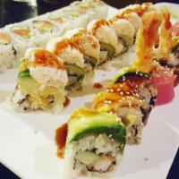 Twister Roll · A house favorite tempura fried lobster tail inside, crab mix and avocado on top with eel sau...
