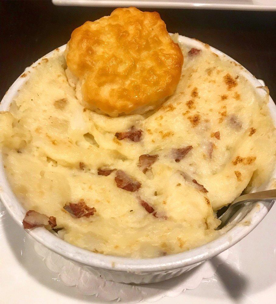 Chicken Pot Pie · Pulled Chicken, Buttermilk Biscuit, Carrots & Peas, Gravy, Baked Mashed Potato Topping