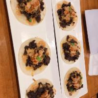 Joint Tacos · 3 street style tacos. Korean beef, onions, kimchi with spicy aioli.