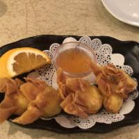 Crab Rangoon · Crab mixed with cream cheese lightly fried in wonton skin.