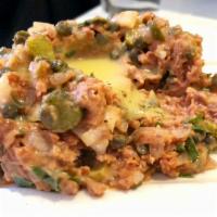 Steak Tartare Vegetale · Finely chopped steak tartare (pea protein, coconut oil and beets) with shallots, parsley, ol...