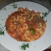 Tortellini · Meat or cheese. Served with tomato sauce.
