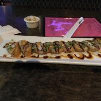 Longhorn Roll · Kanikama, cream cheese, and scallion with spicy mayo and sweet soy. (Tempura Fried) Spicy.    