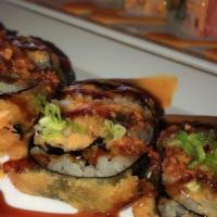 Shaggy Dog Roll · Shrimp tempura and avocado topped with kanikama, masago and spicy mayo. Spicy.    