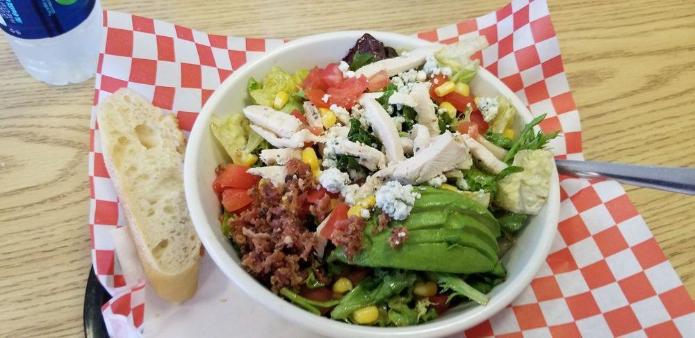 Cobb Salad · Mixed greens, balsamic vinaigrette topped with chicken, tomatoes, corn, blue cheese, avocado and bacon.