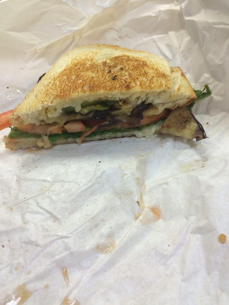 Roasted Vegetable Sandwich · Eggplant and zucchini, lettuce, tomatoes and provolone on sourdough.