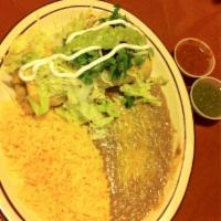 Chimichanga · Fresh flour tortilla filled with cheese, beans and choice of meat, chicken, ground beef, car...