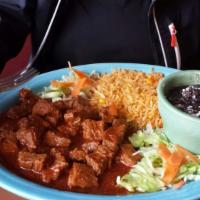 Chicken Mole · Tender chicken breast sauteed in our authentic Mexican mole sauce. Garnished with sesame see...