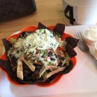 Mexican Fusion Salad · Lettuce, organic cabbage, organic black beans, organic corn, organic carrots, pepper, pico d...