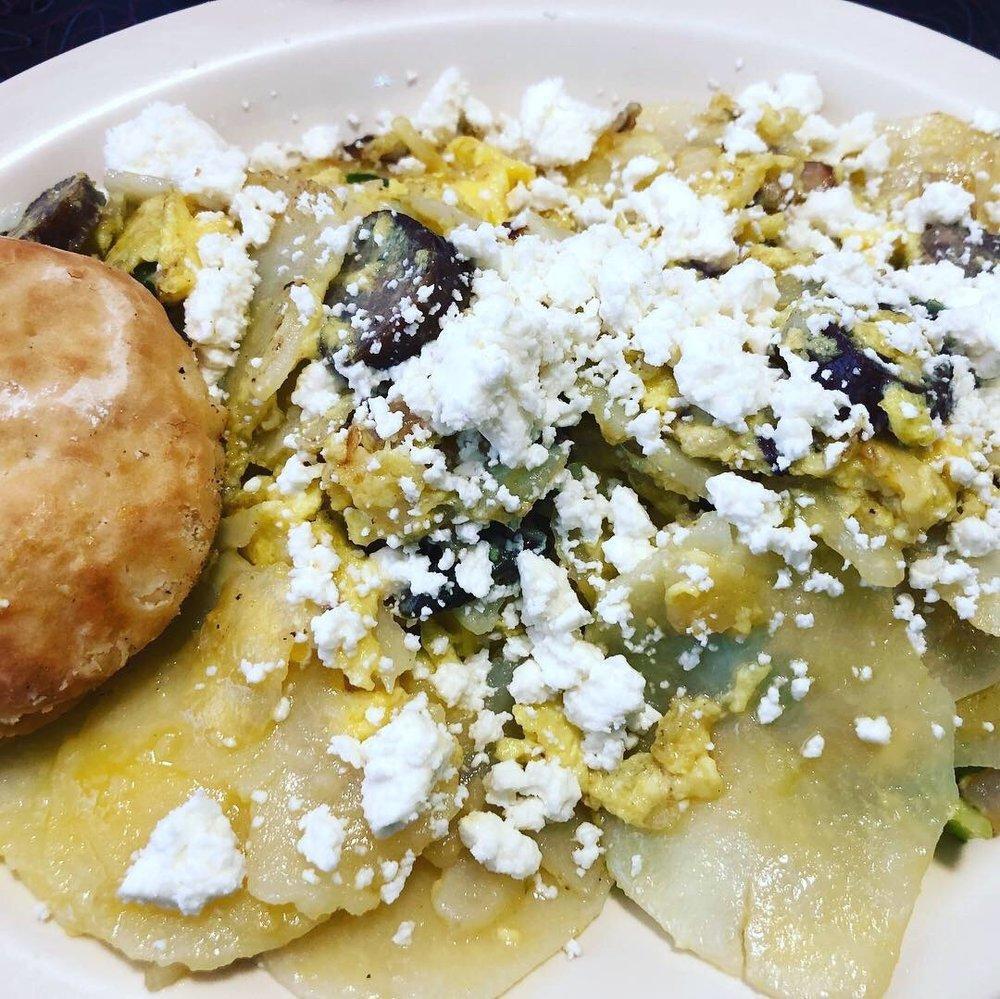 Greek Sausage Skillet · Greek sausage, tomatoes, green peppers, onions, scrambled eggs mixed with home fries and topped with feta cheese.