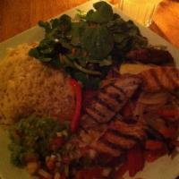 Fajita · Chicken, steak or shrimp with peppers and onions. Served with rice, beans, guacamole, sour c...