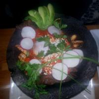 Molcajete · Steak, shrimp, chicken, relleno, and guajillo chili sauce slow cooked in a sizzling molcajet...