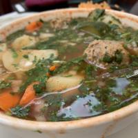 Albondigas Soup · A delicious beef broth with veggies and large meatballs.