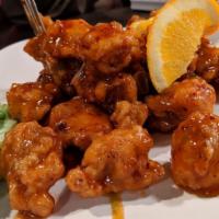 Orange Chicken · Crispy breaded chicken and glazed with a sweet tangy orange sauce. Served with steamed rice....