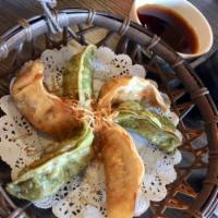Gyoza · 6 piece of deep fried dumplings.
 ** All tempura items will be soggy and cold after 15min  *...