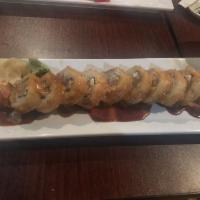 Yellow Jacket Roll · Tuna, salmon, avocado and light cream cheese, tempura fried and topped with spice sauce.