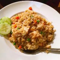 Thai Fried Rice · Egg, onions, peas and carrots.