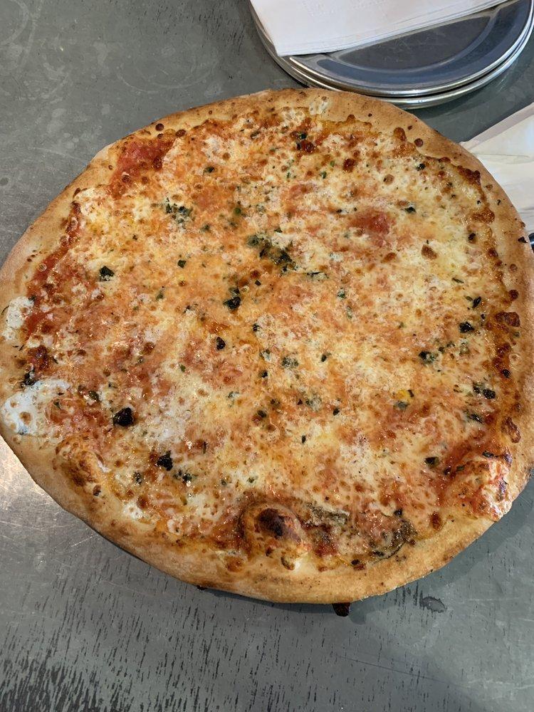 Classic Margherita Pizza · Fresh pizza sauce, buffalo mozzarella, basil, olive oil; Add pepperoni, sausage and meatballs for an additional charge.
