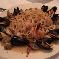 Linguini Pescatore · Shrimp, clams, calamari, black mussels and sauteed served over linguini. 
red or white sauce