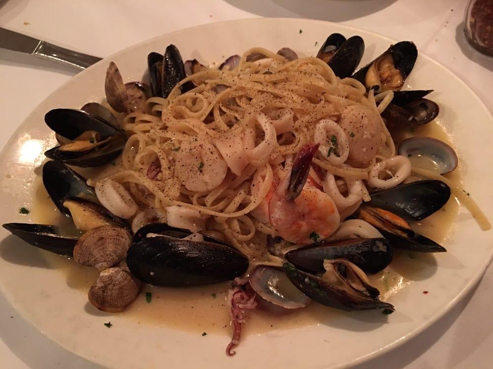 Linguini Pescatore · Shrimp, clams, calamari, black mussels and sauteed served over linguini. 
red or white sauce