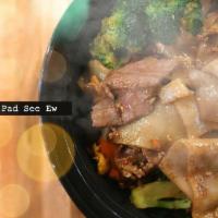 Pad See Ew · Flat rice Noodles stir-fried in sweet soy sauce with broccoli, carrots and egg with your cho...