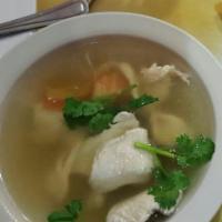 Tom Yum Soup · World famous Thai lemongrass soup with mushrooms, tomatoes, cilantro and your choice of prot...