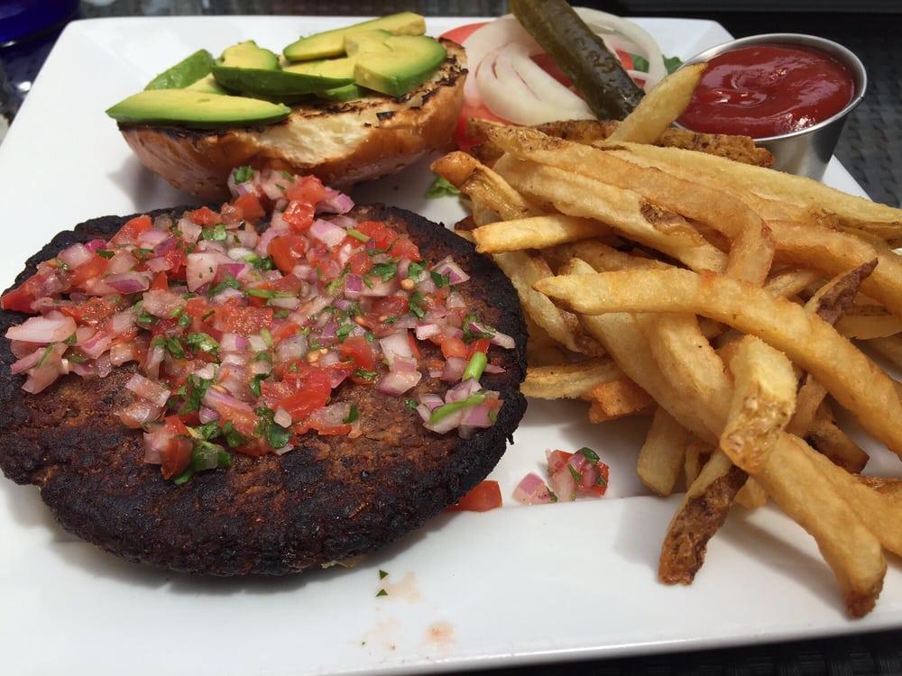 Black Bean Burger · Hand-formed ½-pound Black Bean Patty with Avocado, Chipotle aioli, Served with Mixed Greens Salad