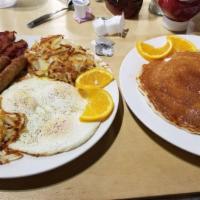 Super Breakfast · 3 eggs, 2 bacon, 2 sausage, 3 pancakes and 2 hashbrowns.