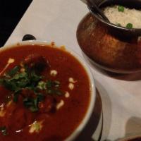 Chicken Tikka Masala · An all time favorite, broiled in clay oven and simmered in creamy tomato curry sauce. Served...