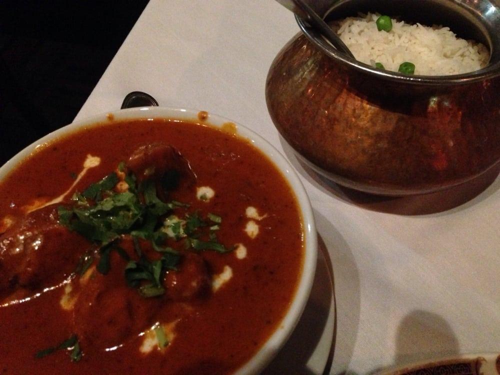Chicken Tikka Masala · An all time favorite, broiled in clay oven and simmered in creamy tomato curry sauce. Served with basmati rice. Halal.
